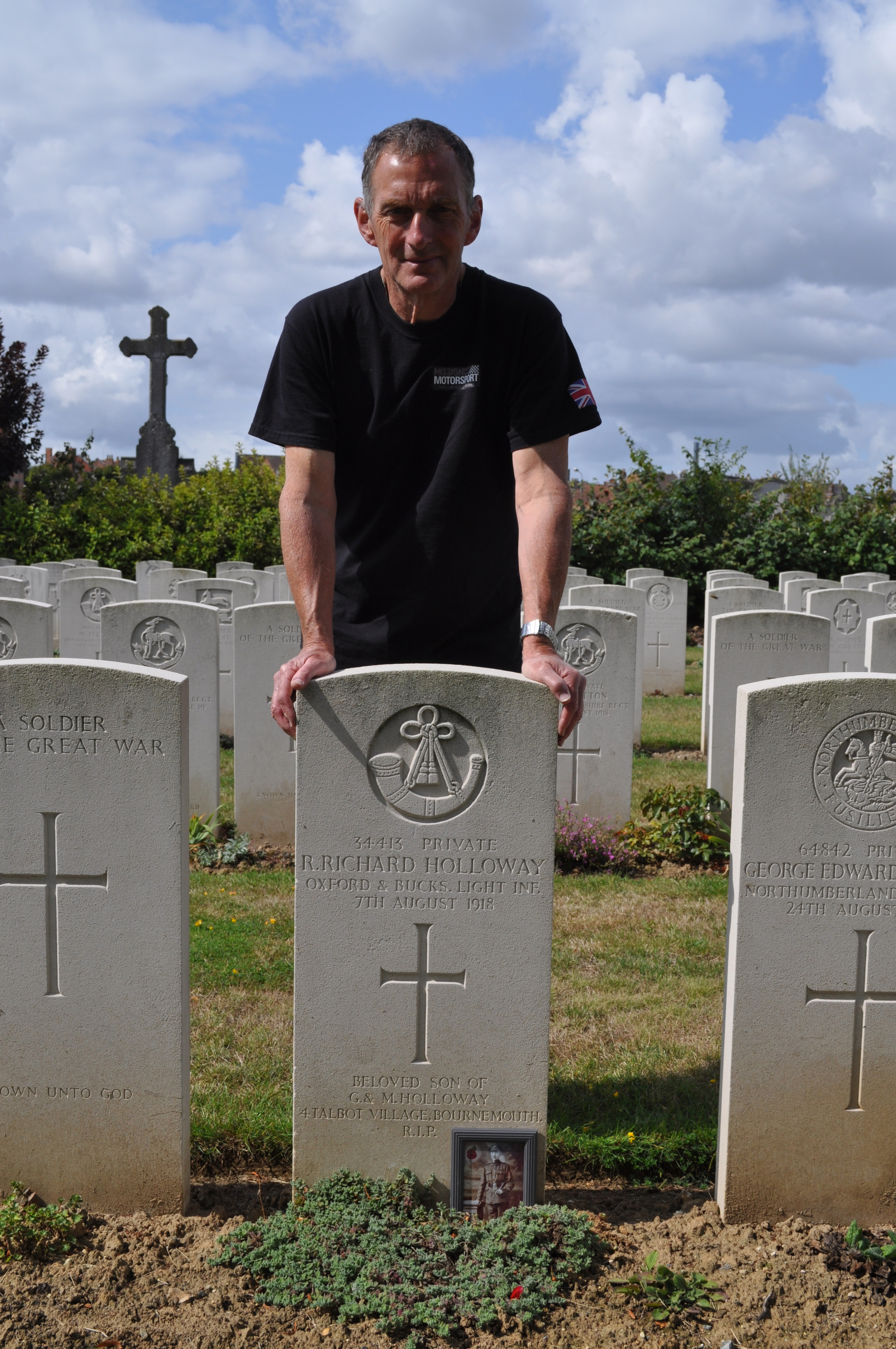 TIFF No 3 Phil Holloway at Great Uncle Richards grave in Merville France